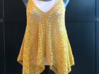 Read this article: Crochet Summer Tank Top Pattern